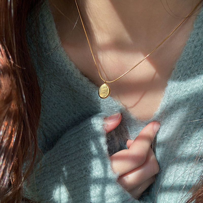 Goud Kleur Onregelmatige Engel - Birth Flower Necklace recensie en prijs