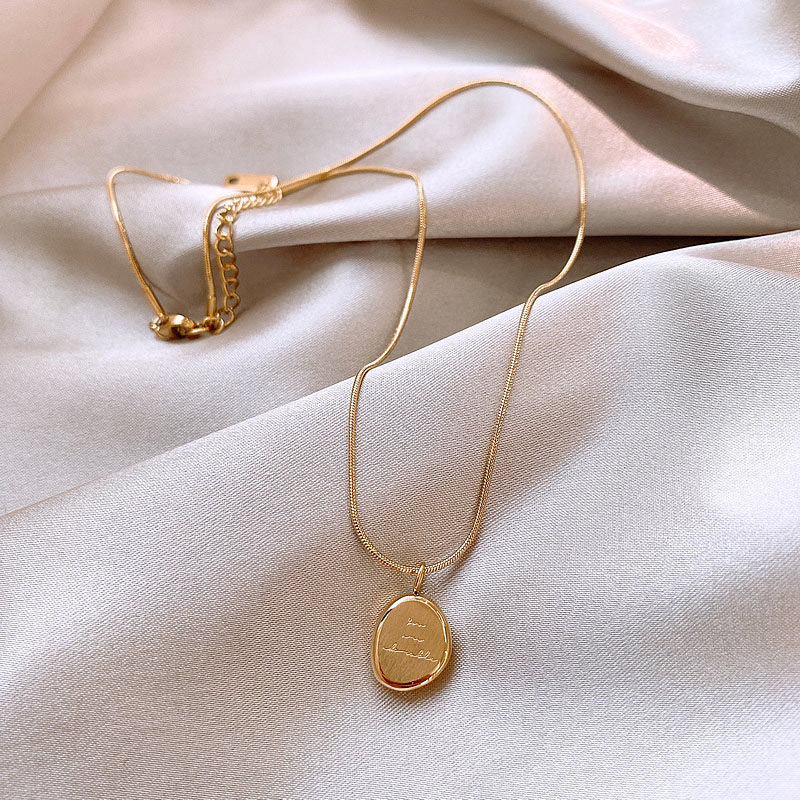 Goud Kleur Onregelmatige Engel - Birth Flower Necklace recensie en prijs